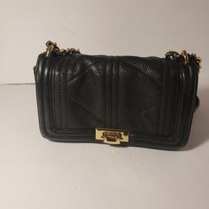 Selling Sam Edelmam black bag.